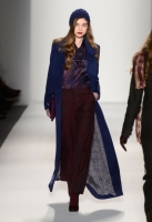 A model walks the runway at the Noon By Noor Fall 2013 fashion show during Mercedes-Benz Fashion Week at The Studio at Lincoln Center on February 8, 2013 in New York City.