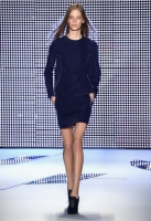 A model walks the runway at the Lacoste fashion show during Mercedes-Benz Fashion Week Fall 2014 at The Theatre at Lincoln Center on February 8, 2014 in New York City.