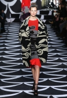 A model walks the runway at the Diane Von Furstenberg fashion show during Mercedes-Benz Fashion Week Fall 2014 at Spring Studios on February 9, 2014 in New York City.