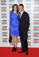 Actor Daniel Bruhl and Felicitas Rombold (L) attends the 2012 Jameson Empire Awards 