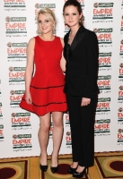  Evanna Lynch and Bonnie Wright during the 2012 Jameson Empire Awards