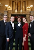 VIENNA, AUSTRIA - JULY 23:   (EDITORS NOTE: This image has been digitally manipulated) Tom Cruise (C) and members of the cast and crew pose during the world premiere of 'Mission: Impossible - Rogue Nation' at the Opera House (Wiener Staatsoper) on July 23, 2015 in Vienna, Austria.  (Photo by Andreas Rentz/Getty Images for Paramount Pictures International)
