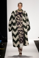 A model walks the runway during the Academy Of Art University Fall 2014 Collections during Mercedes-Benz Fashion Week Fall 2014 at The Theatre at Lincoln Center on February 7, 2014 in New York City.