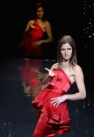 A model walks the runway at Go Red For Women - The Heart Truth Red Dress Collection 2014 Show Made Possible By Macy's And SUBWAY Restaurants  at The Theatre at Lincoln Center on February 6, 2014 in New York City.